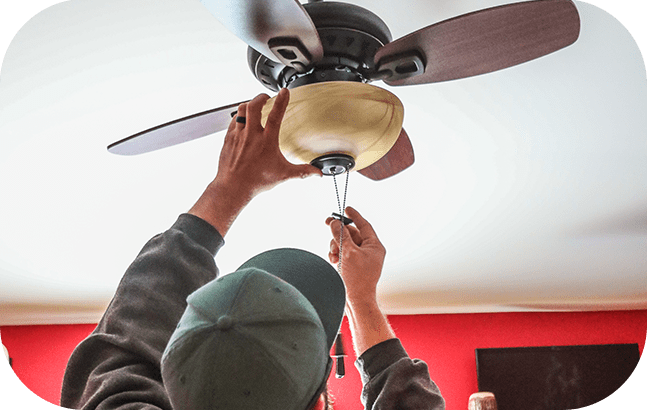 Electrical Service, An Electrician installing a ceiling Fan
